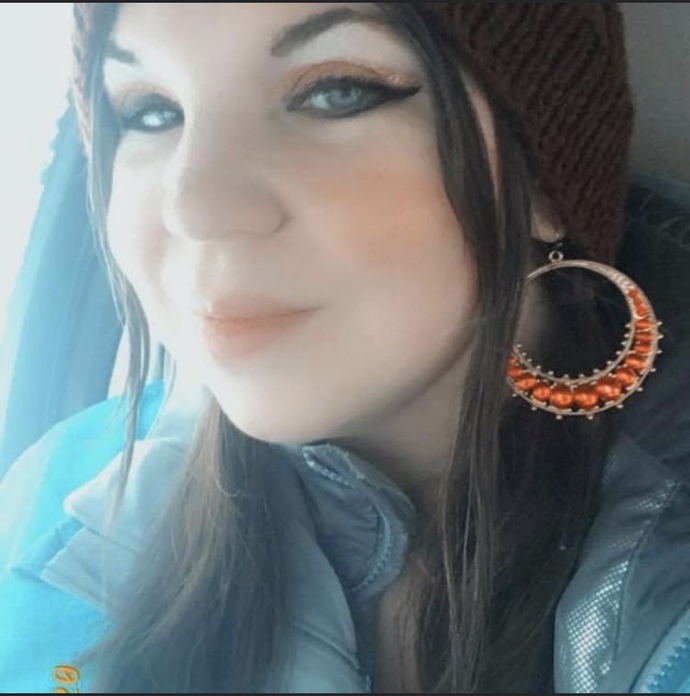My favorite earrings! You can see I tried the 90s style eyeliner here in an attempt to age myself.