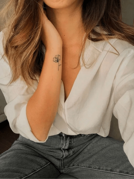 Why do girls get tattoos? Would you date a girl who has tattoos?