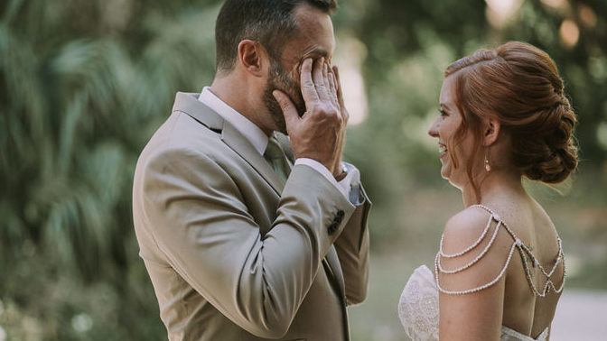 What do you think makes the bride/groom start crying when she comes down the aisle to him?