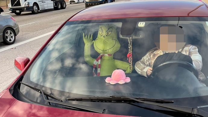 Inflatable Grinch in the HOV Lane