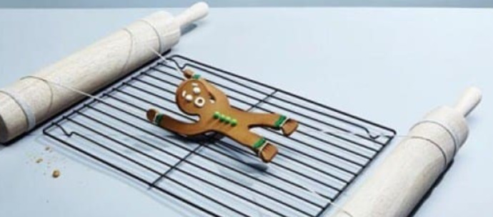 When eating a gingerbread man what do you bite first?