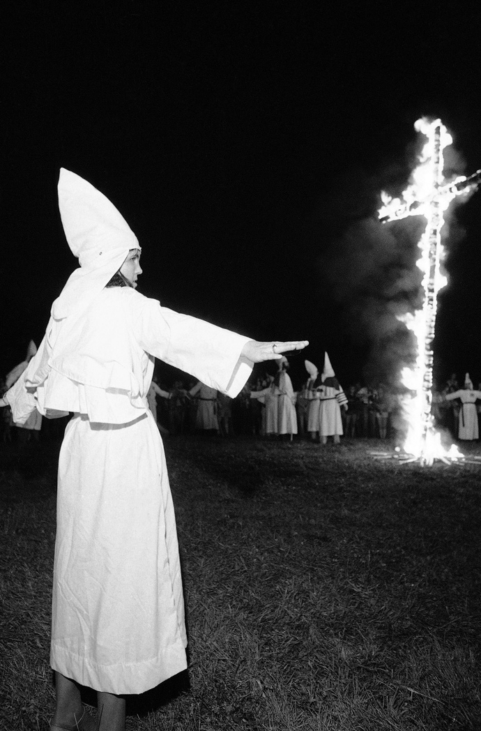 Am I wrong to not care about my girlfriend being in the KKK since it is how she was raised?