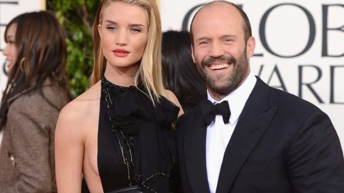 From the list of "Top Greatest Male Hollywood Physiques", whose wife is the strongest?