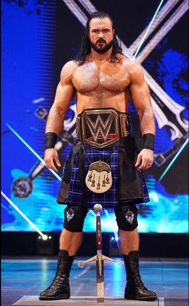 Who has the better weight advantage and muscle mass, Brock Lesnar or Drew McIntyre?