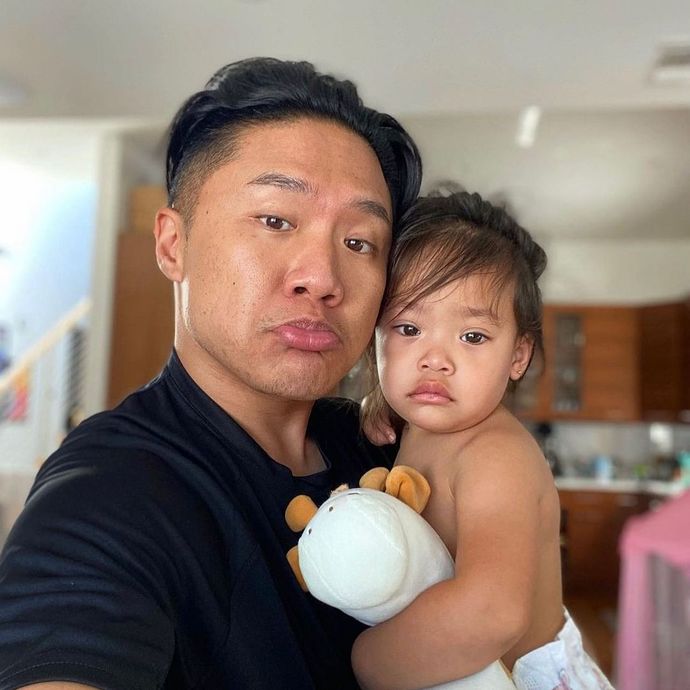 Does this baby look more like her dad or her mom?