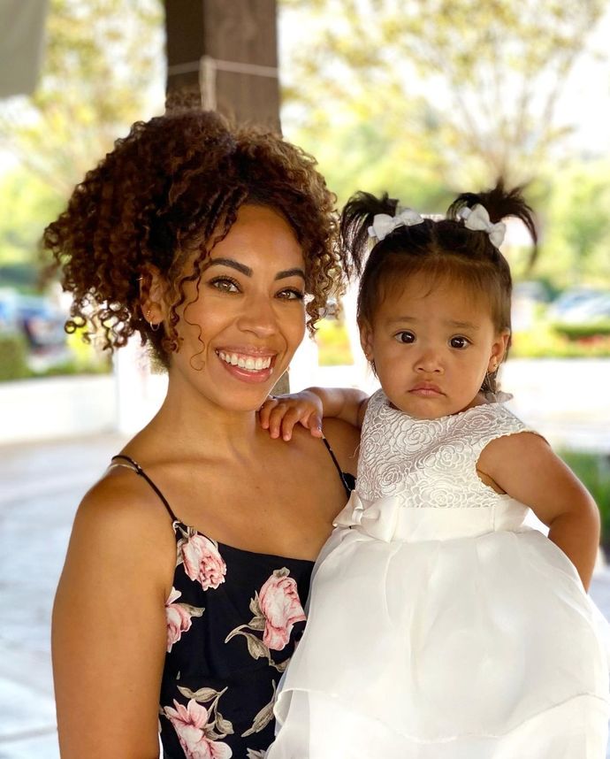 Does this baby look more like her dad or her mom?