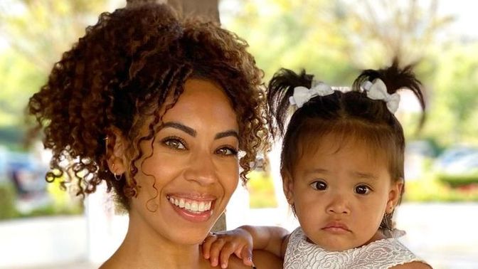 Does this baby look more like her dad or her mom?
