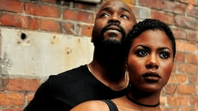 Man and Woman in bed hear a loud noise downstairs. Who should go check?