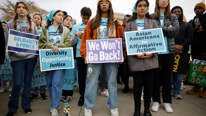 Proponents for affirmative action in higher education rally in front of the U. S. Supreme Court