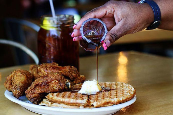 Do you enjoy some chicken and waffles with sweet tea?
