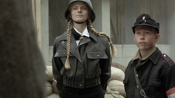 Ex female concentration camp guard dies aged 99, town mayor calls her a "great woman" - thoughts?
