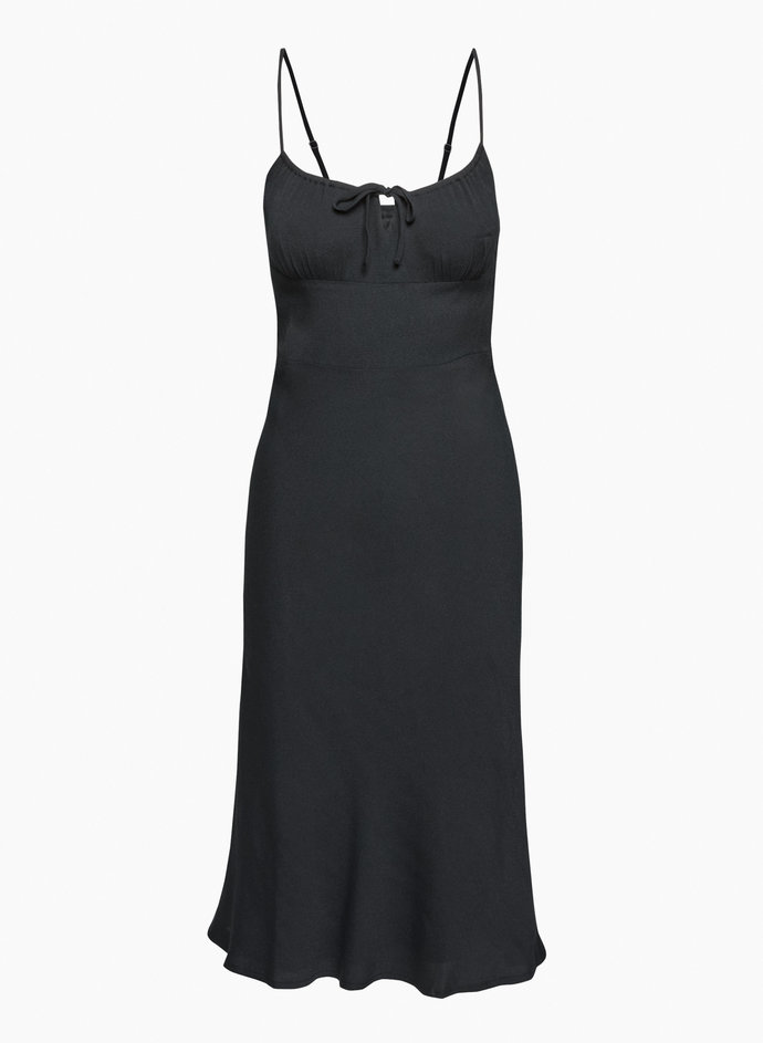 What color of this dress would suit pale skin and platinum hair the most?