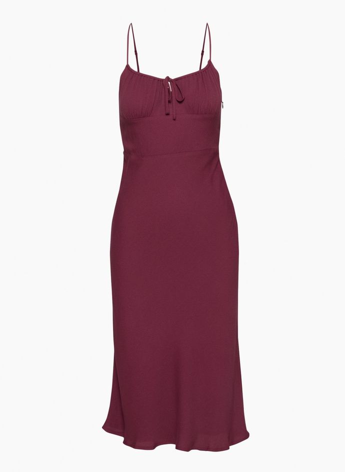What color of this dress would suit pale skin and platinum hair the most?