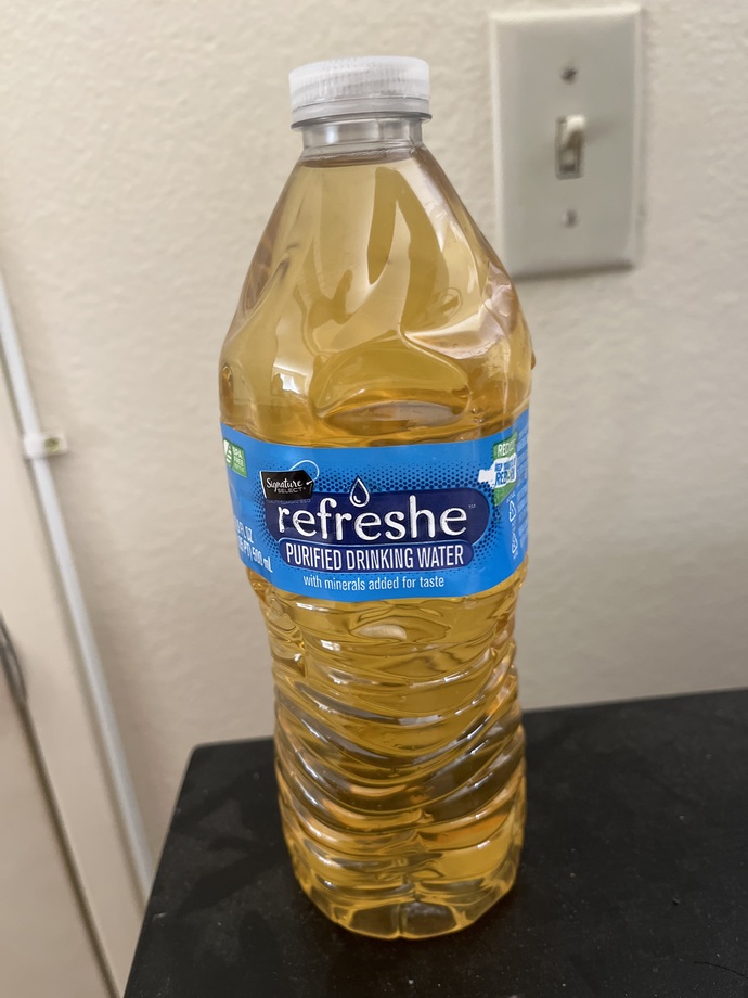 How do you describe this urine bottle?