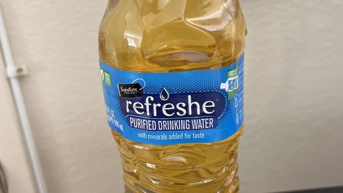 How do you describe this urine bottle?