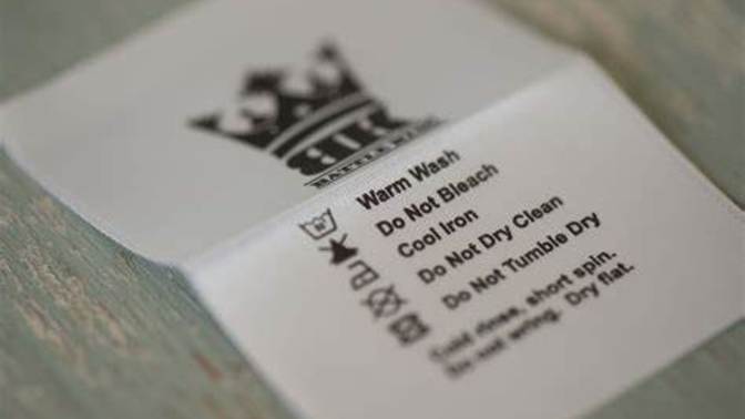 Clothing labels. Do you also remove them completely from clothing that has just been bought?