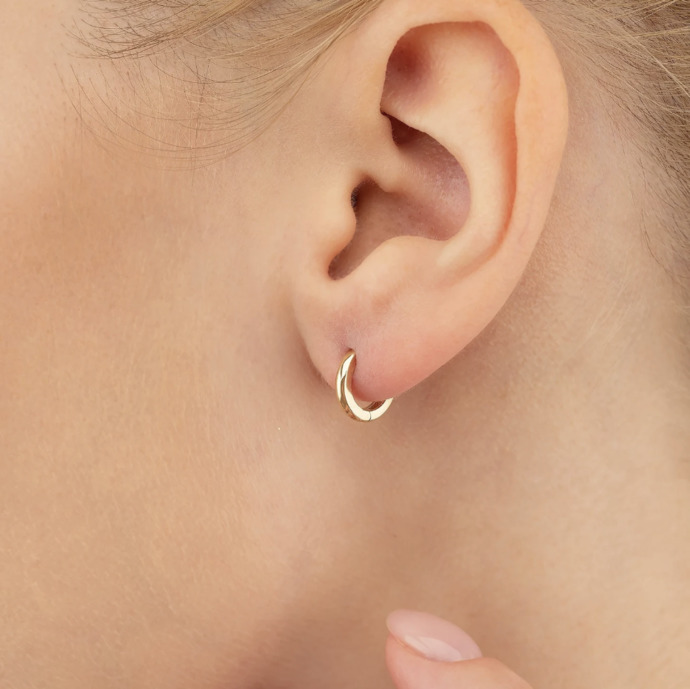 Which one of these earrings would look best with this tiny cross necklace?