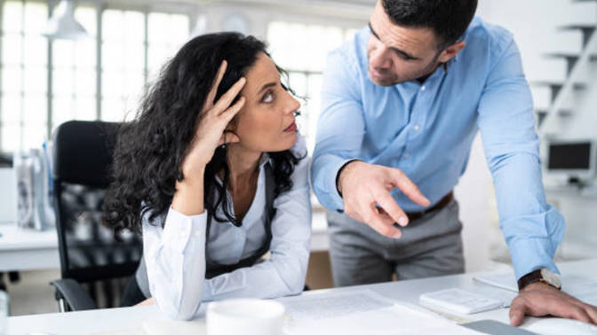 Boyfriend won't stop talking to coworker who likes him, is this a good enough reason to break up with him?