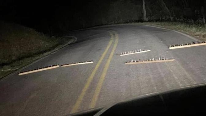 What would you do if you are driving down the road and see this?
