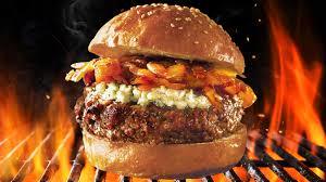 A blue cheese burger with crispy onions.
