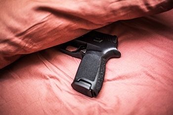Do you sleep with your gun under your pillow?