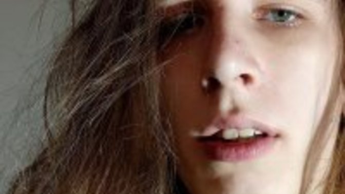 Is this long haired guy attractive in your opinion?