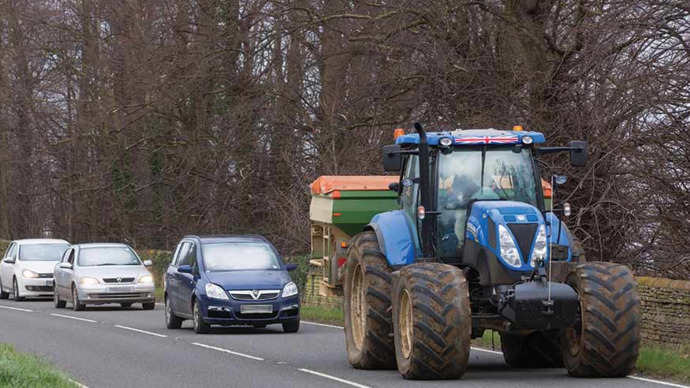 It is only polite not to pass tractors until they turn off into a corn field.