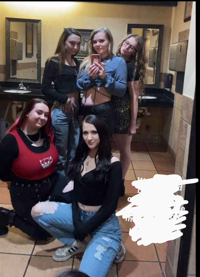 Guys, whats your assumption of the women in this photo?