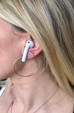 How do you approach a girl or talk to her if she has AirPods wireless earphones on?