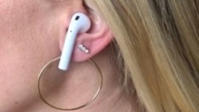 How do you approach a girl or talk to her if she has AirPods wireless earphones on?