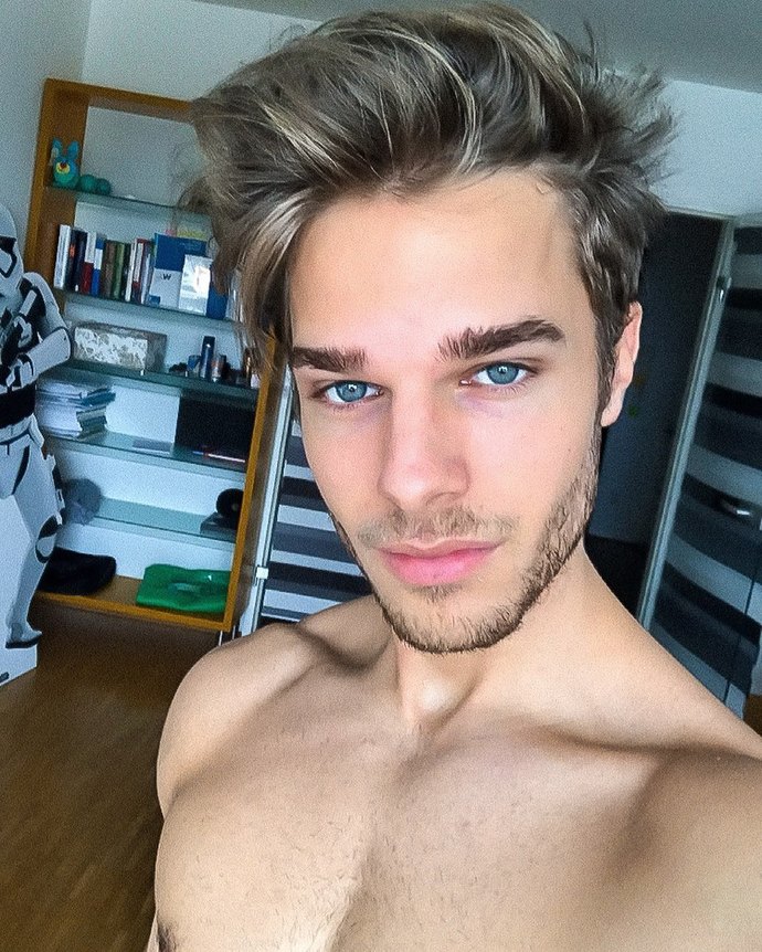 Is this blond-haired and blue-eyed boy handsome?