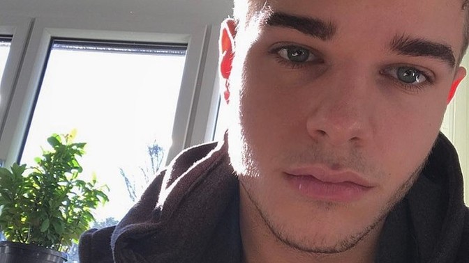 Is this blond-haired and blue-eyed boy handsome?