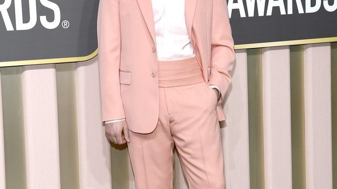 Can a guy who dress with some effeminate clothes means he is gay?