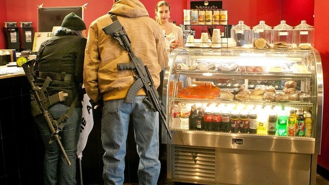 Should open carry be illegal (not in terms of having your gun on your side showing it) but rather you can't hold a gun in your hands pubically?