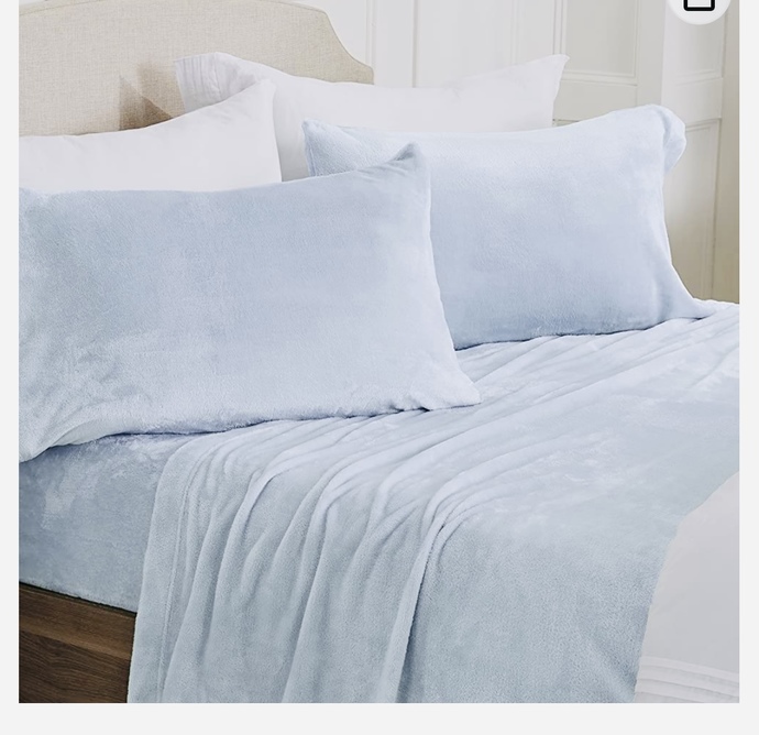 Which decal do you like best: next to or behind white bed, between two windows?
