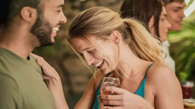 What is the best way to show a guy you are interested without coming forward with them directly?