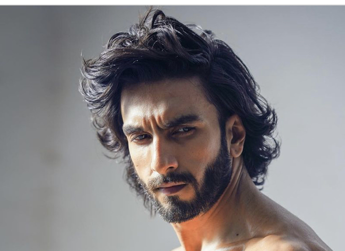 Girls, Does this guy have nice hair in your opinion?