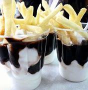 French fries in hot fudge sundaes