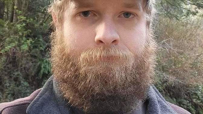 Do I look strange with a beard?