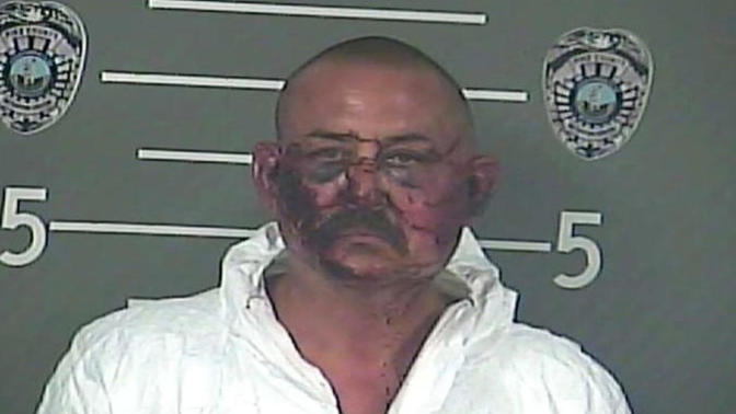 How come cop killers mug shots always look like this?