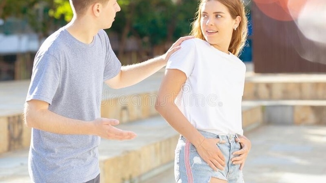 How do I start a conversation with a girl in my class?