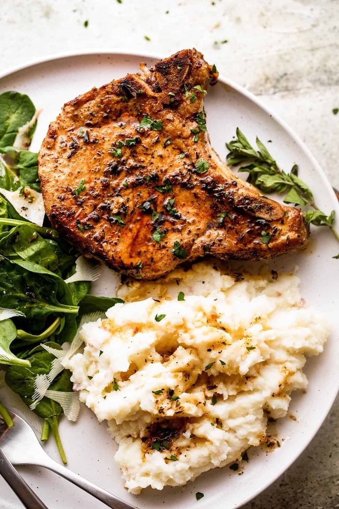 a. OVEN BAKED BONE-IN PORK CHOP