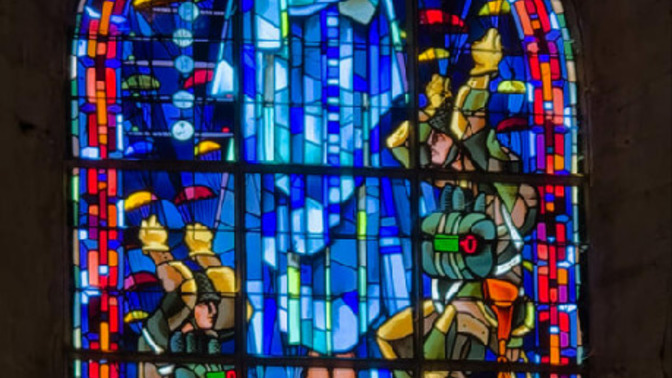 This stained glass window is at the Church in Sainte-Mère-Église. Is it racist?