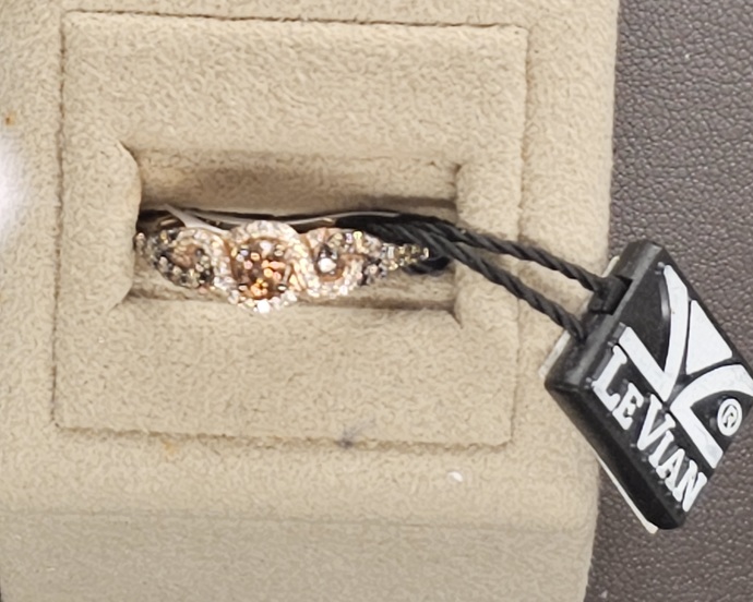 Would a man mind if his girl offered to split the cost of the engagement/wedding bands or if she covered most if not all of her ring?