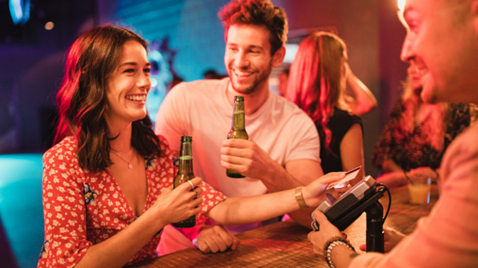 If I invite a guy friend to a bar am I obligated to buy him a drink?