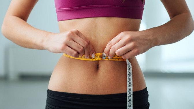 I want to start dating again but should I wait until I reach my weight loss goal?