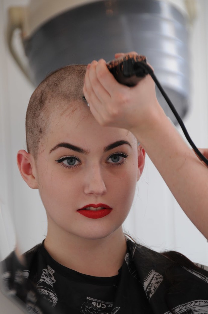 How come men that enlist in the military have to have their head shaved for bootcamp, but women dont?