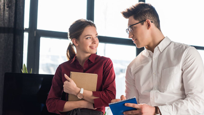 How can you tell when a male coworker likes you?
