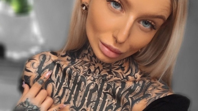Does anyone know what her chest tattoo says?