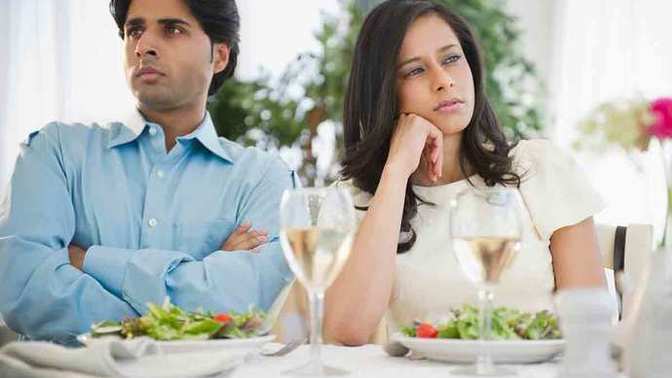Is it rude to separate couples at a dinner gathering?
